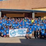 A large group of Comcast Cares Day volunteers.